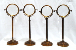 Four lenses on brass stand Foto © Pierandrea Malfi